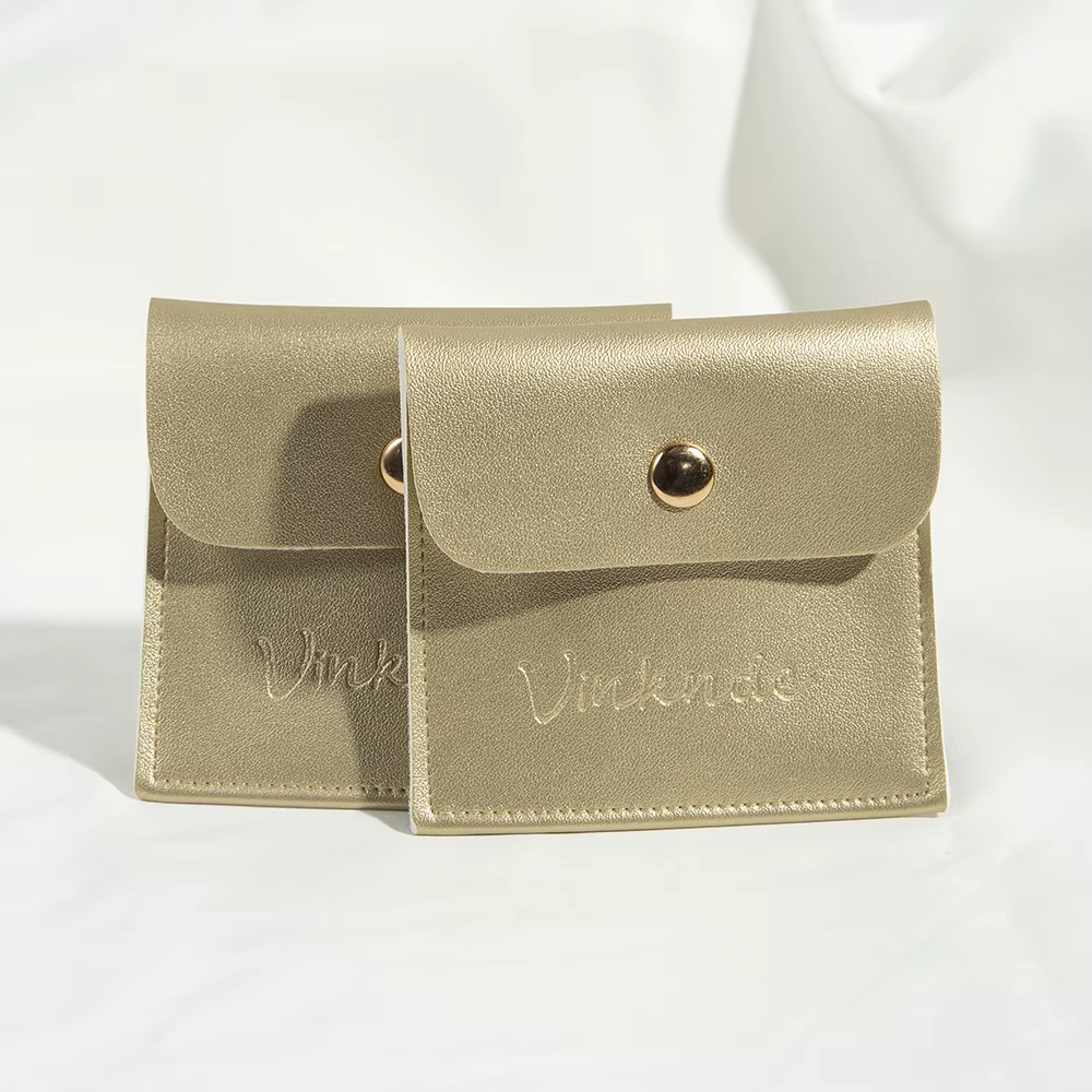 Pochette de luxe en cuir doré pour bijoux, avec bouton-pression, pour emballage personnalisé, rangem