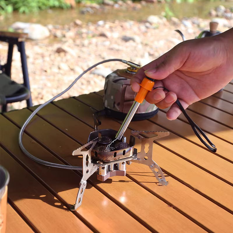 Allumage électrique portable pour réchaud de camping