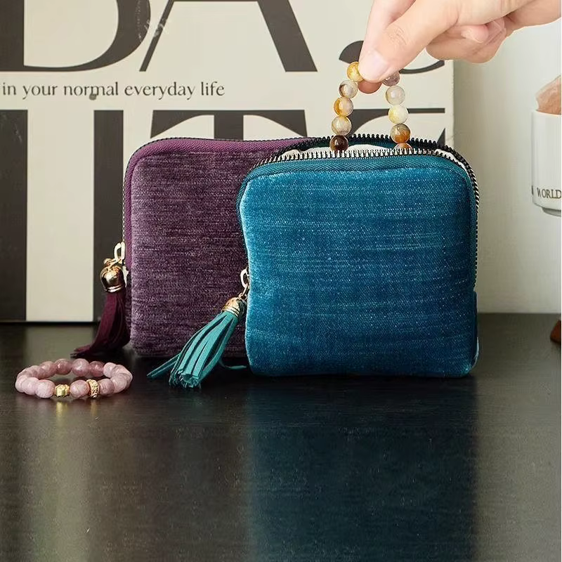 Sac de rangement pour bijoux exquis avec pendentif en forme de pompon