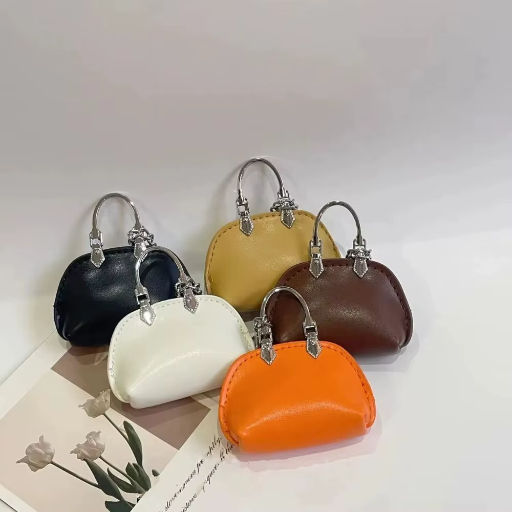 Nouveau Sac décoration sac pendentif petit cuir PU Mini sac à main couleur unie sac suspendu