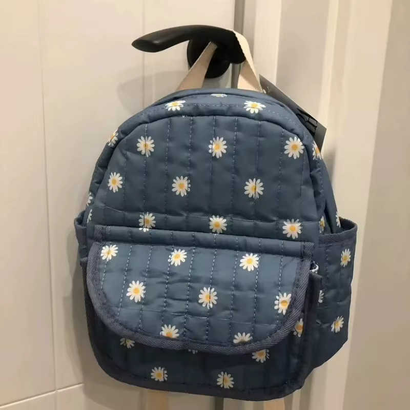 Sac à dos d'étudiant bleu marguerite de dessin animé, sac d'école brodé mignon, sac à dos décontracté unisexe tendance pour les voyages en plein air