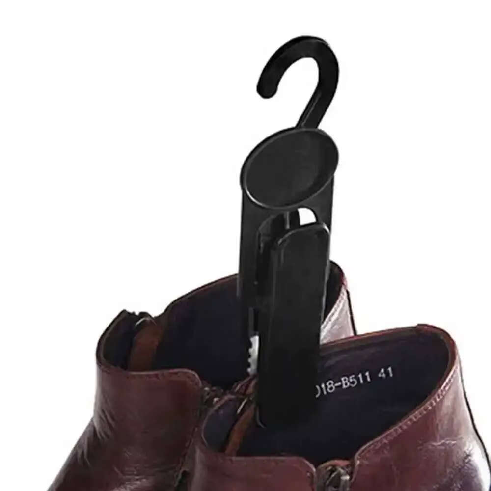 Clip de fixation noir pour chaussures