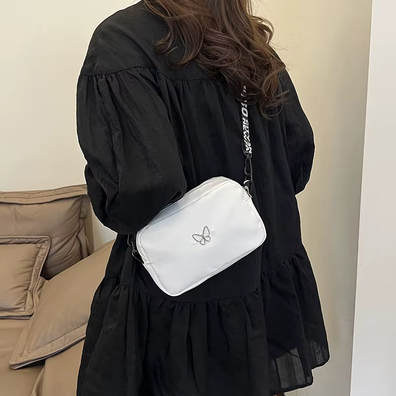 Sac à bandoulière noir et blanc