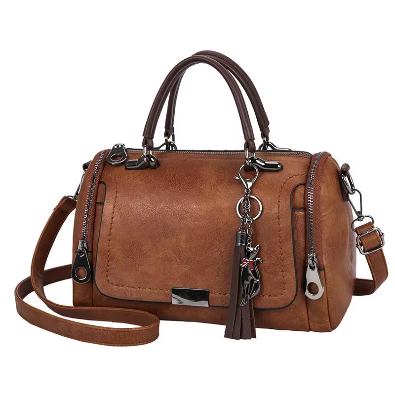 Sac à bandoulière de grande capacité pour femmes avec décoration de pompon