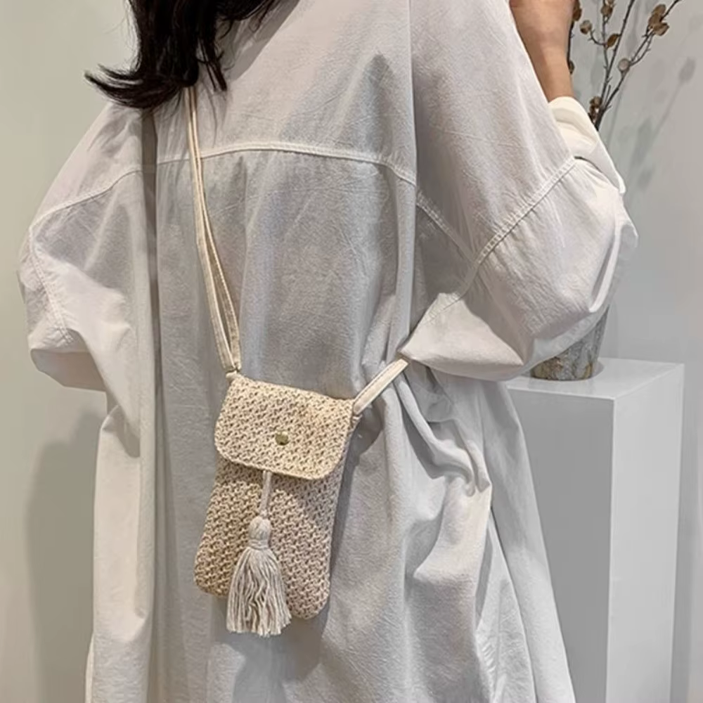 Sac à main portable en paille tressée avec longue pampille, pochette pour téléphone faite à la main pour femme, design de niche, style coréen, sac de plage tressé pour l'extérieur