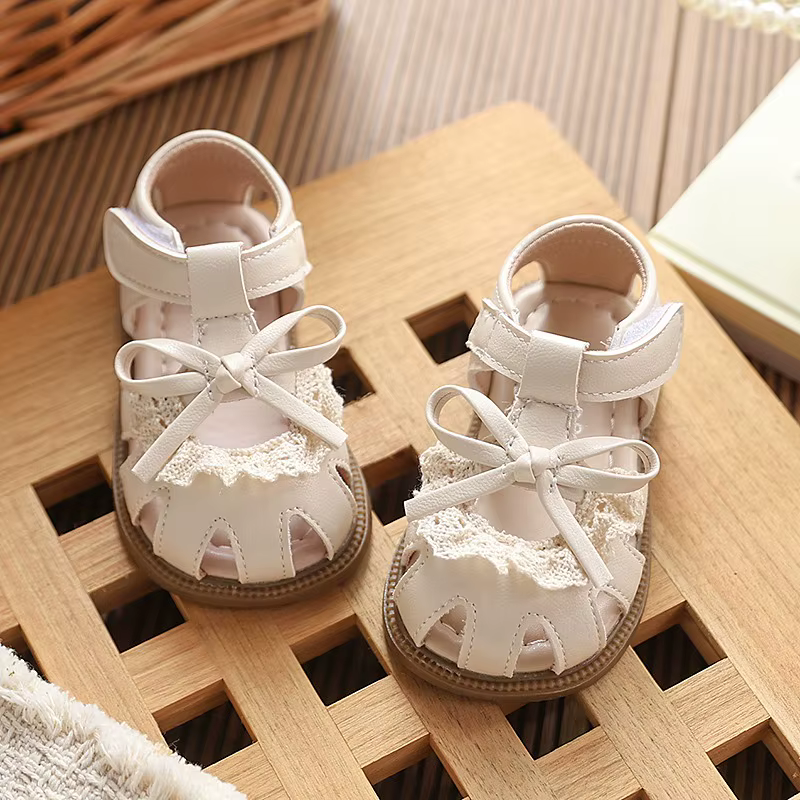 Chaussures de marche pour bébé, sandales de plage pour enfants, avec nœuds simples et mignons, semelle souple ajourée, antidérapantes, nouvelle collection été 2026, sandales de princesse pour tout-pet